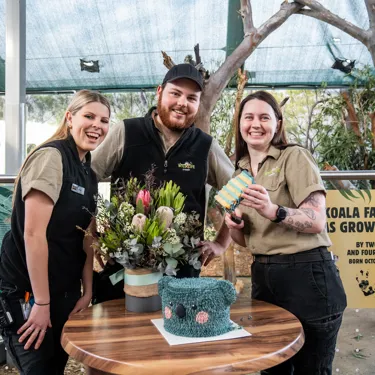 Keepers L To R Chloe Minto, Oliver Whiley And Lily Williams Celebrate Koala Joey Gender Reveal WILD LIFE Sydney Zoo